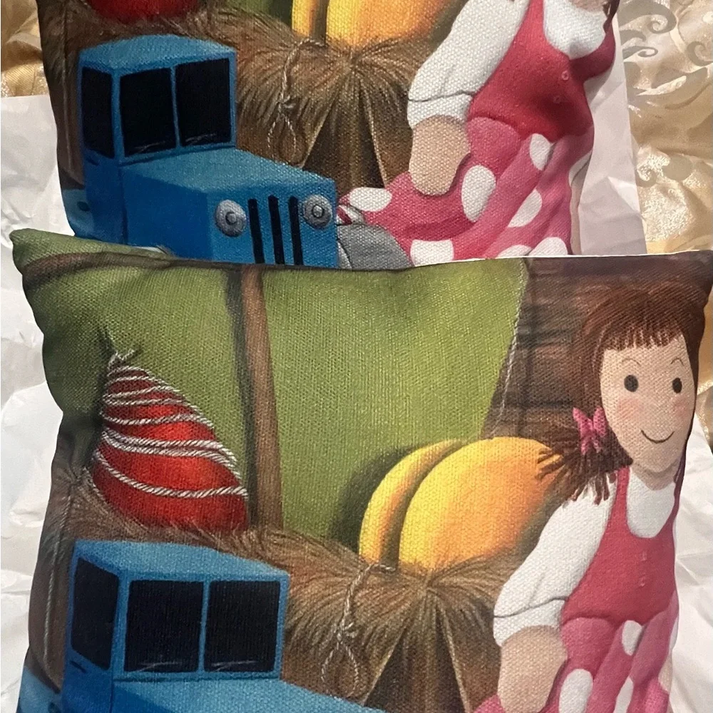 Mandy Pritty whimsical Art throw pillows/2 .blue tractor and doll- pristine
